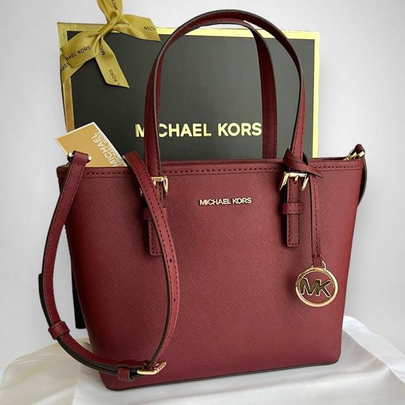 Michael Kors Handbags - NWT Michael Kors Jet Set Travel Saffiano Leather Zip Top Tote Dark Cherry $448